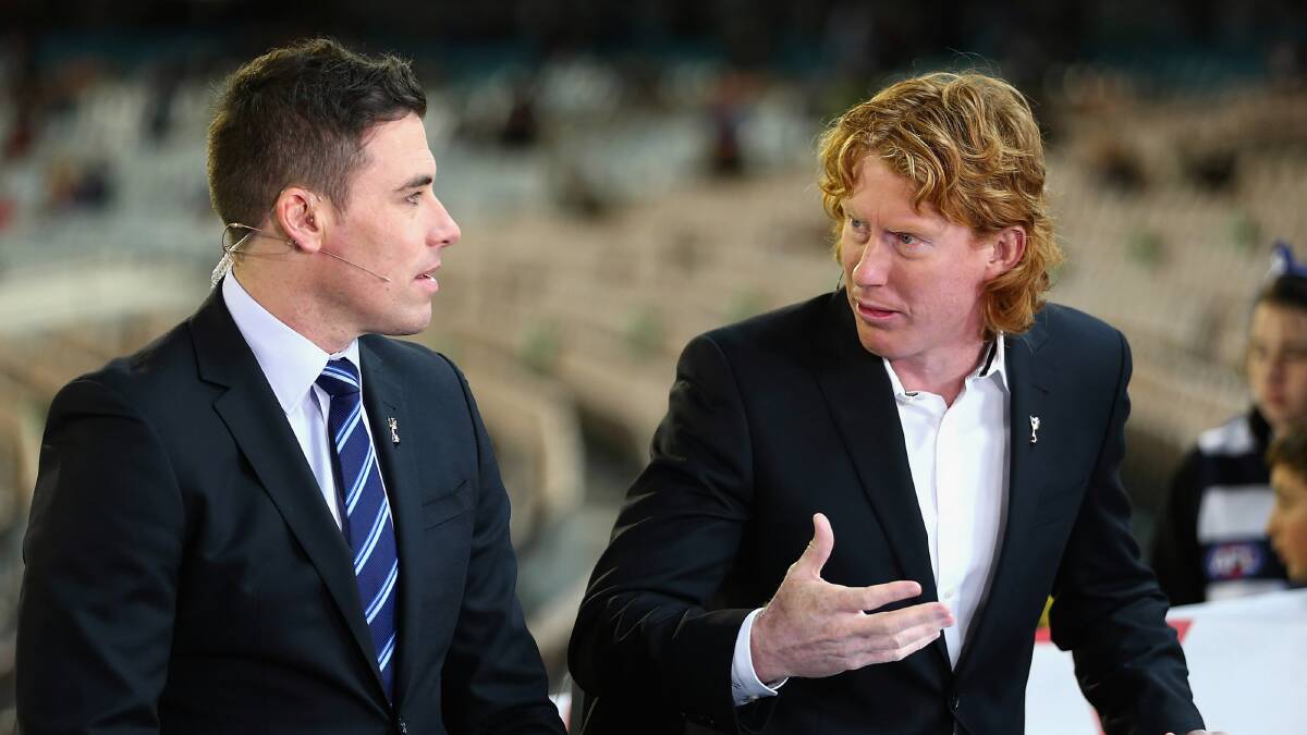 Matthew Richardson and Cameron Ling commentate during a finals match in 2012. Picture: GETTY IMAGES