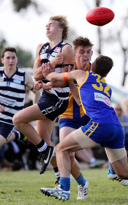 Finlay's Jess Koopman gets tackled by Deniliquin's Clay Howe.