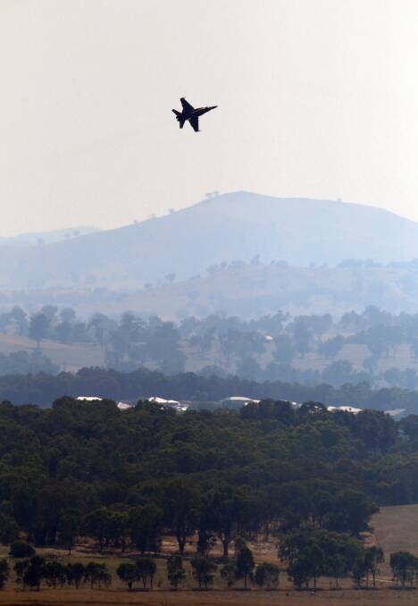 Daley McLeod flies his Royal Australian Air Force FA-18 Hornet jet over Albury yesterday. Picture: DAVID THORPE