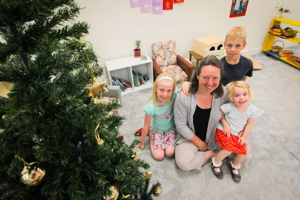 Nicola Bussell with Jack, 9, Sophie, 7, and Emily, 2. The gifts her children receive reinforce her parenting philosophies. Picture: DYLAN ROBINSON
