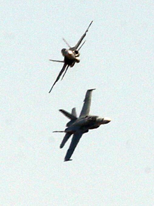 one of two RAAF Hornets that flew over Albury. Picture: PETER MERKESTEYN