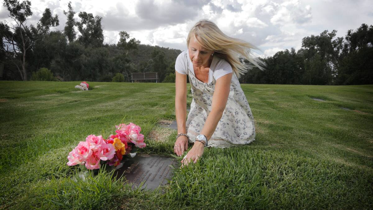 Fiona Oliver is disappointed the area where her familiy graves are will not be part of the planned maintenance work that prevents grass growing over the top of plaques. Picture: TARA GOONAN