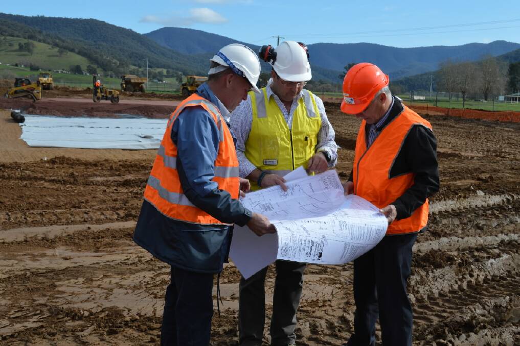 Joss Constructions operations and construction manager Craig Martin, Bill Tilley and Department of Environment and Primary Industries Hume regional director Peter Farrell at the Eskdale construction site yesterday.