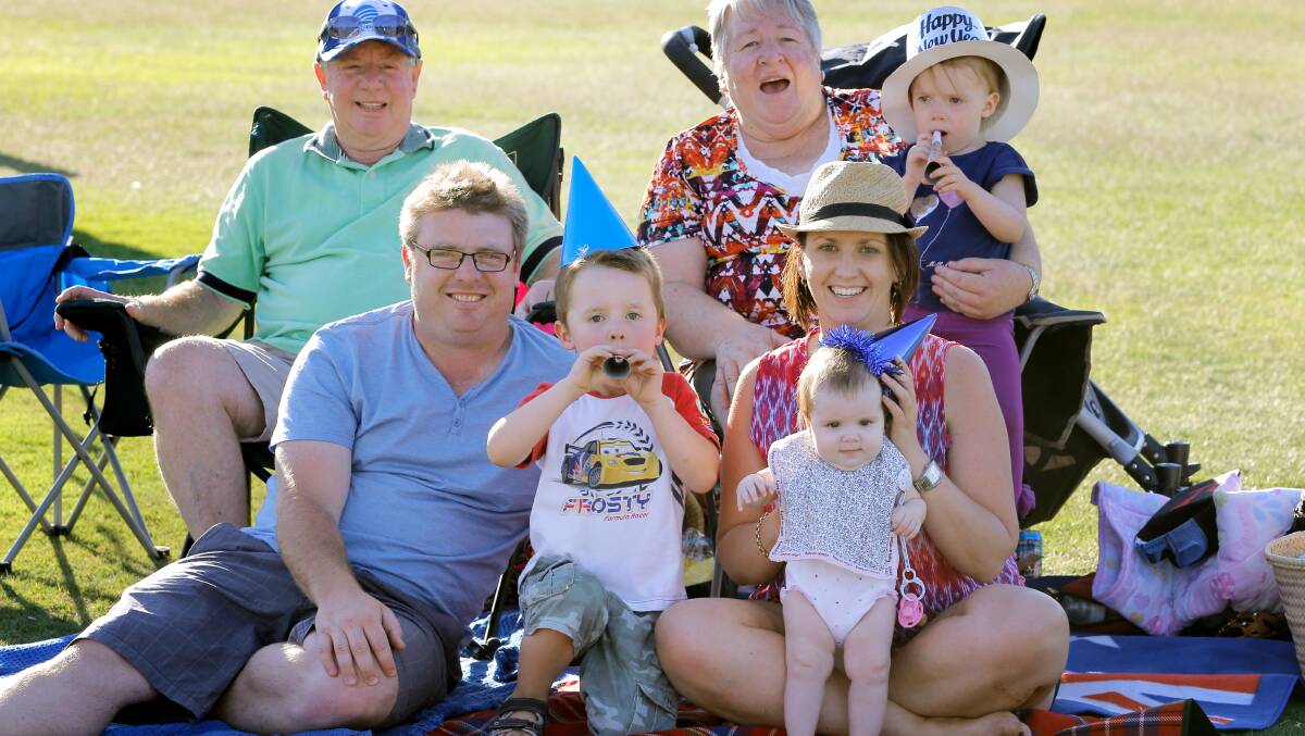 The McHale family: Grandparents Colin and Carmen are in the back with Amelia, 2. At the front is Chris, Riley, 5, Amanda, and Georgie, 5 months. Picture: TARA GOONAN