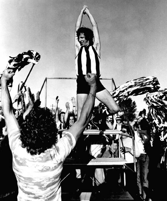 Phil Nolan celebrates after Wangaratta’s 1976 premiership win against Wangaratta Rovers.
