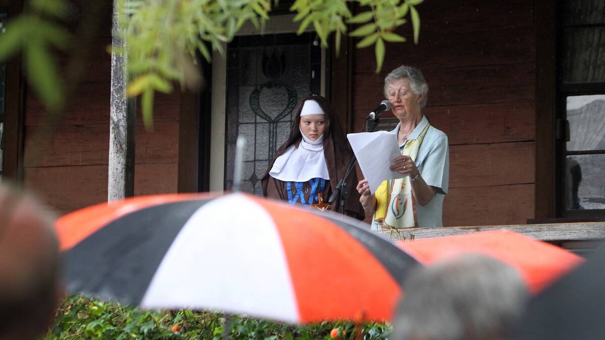 Caitlan Klippel, 12, from Sacred Heart School, playing the part of Sister Mary MacKillop and Sister Pat George.