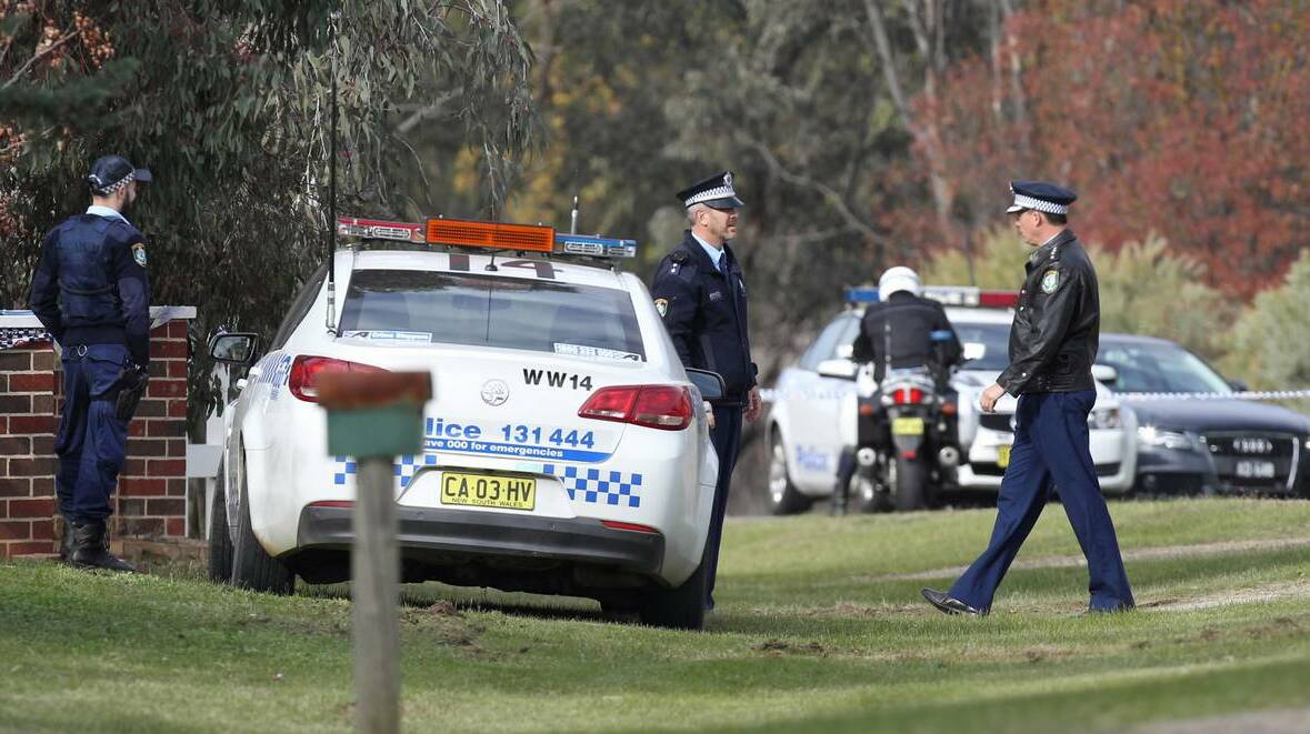 Police at a property at Springvale, Wagga, where a man was killed in his back yard. Picture: DAILY ADVERTISER