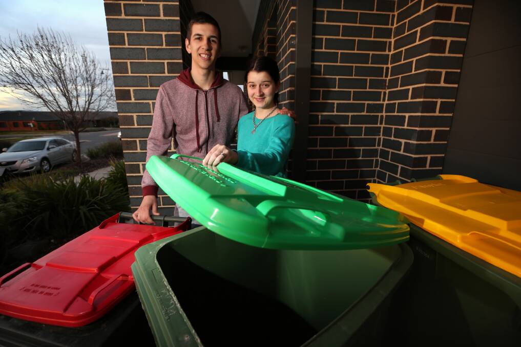 Wodonga’s Adrian Bader and Tiffany Loss are set for the start next week of the city’s organic waste collection service. Picture: MATTHEW SMITHWICK