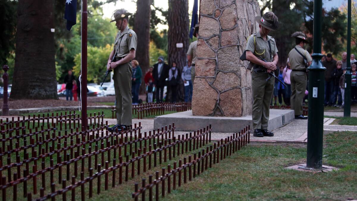 Hundreds of crosses bearing the names of fallen soldiers were placed near the cenotaph for the Anzac Day ceremony at Beechworth. Picture: MATTHEW SMITHWICK