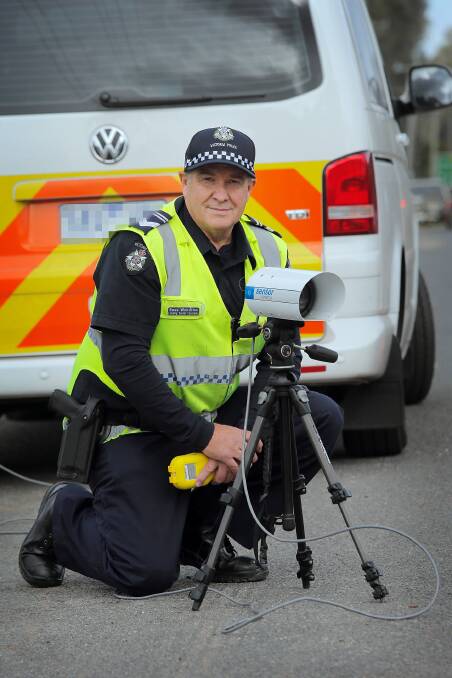 Leading Sen-Constable Ross Woodrow with the number plate scanning camera used the two day blitz around Wangaratta and district. Picture: TARA GOONAN
