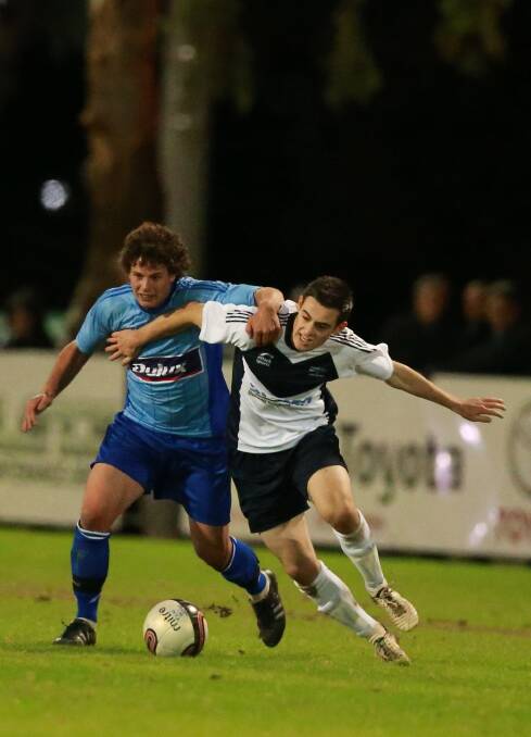 NSW's Sam Graetz and Victoria's Tom Morrison go into battle at the soccer State of Origin. 