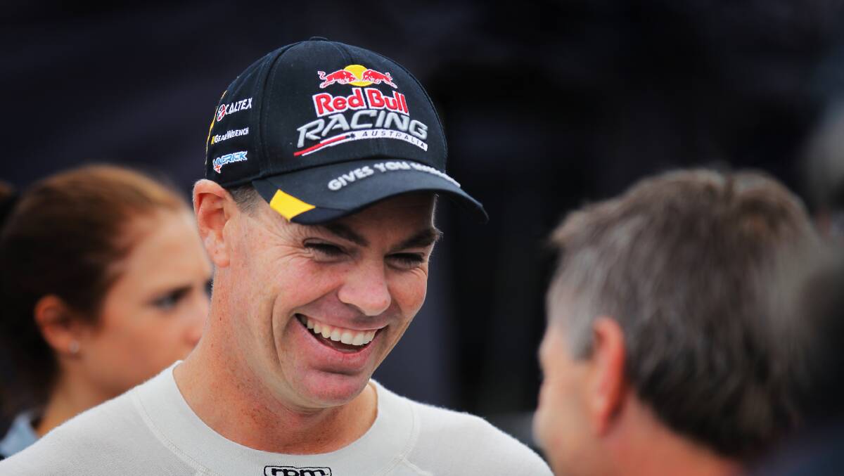  Supercar driver Craig Lowndes talks to fans.