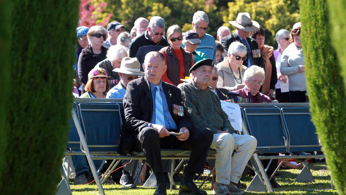 A pair of diggers during the Anzac Day ceremony at Mount Beauty. Picture: MATTHEW SMITHWICK