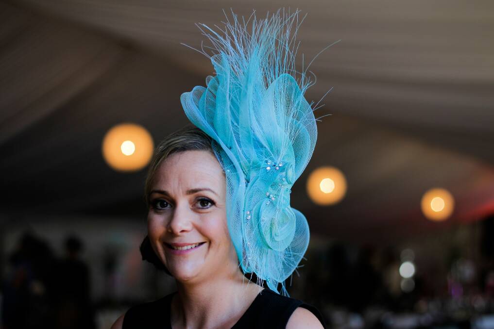 Kate Miller wears a fascinator, which was worn by Gai Waterhouse, and was auctioned yesterday for $400.