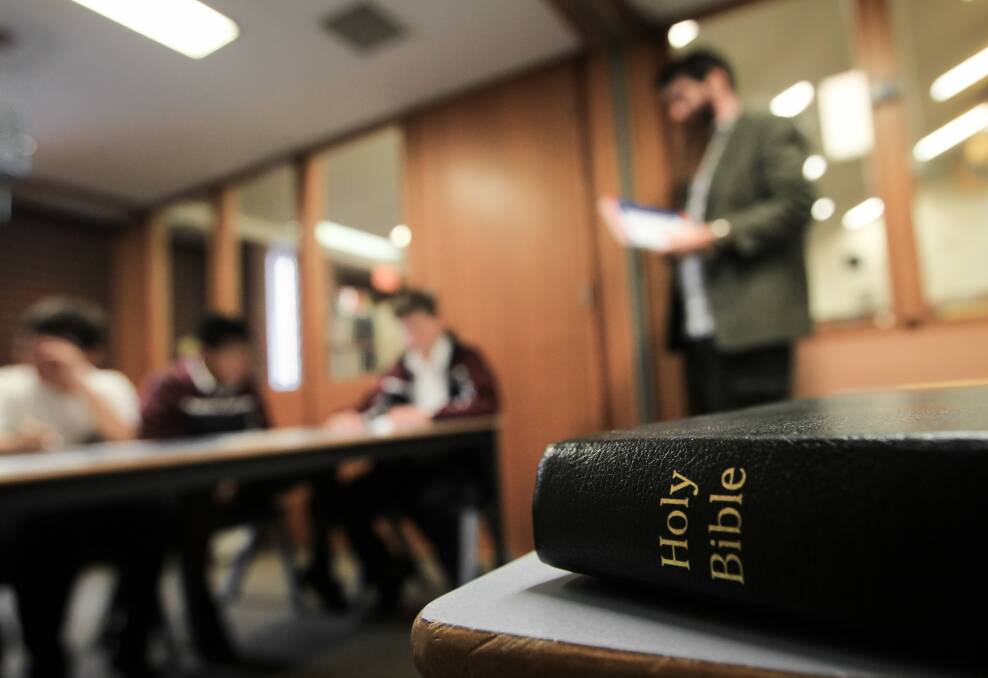 James Fallon High School scripture teacher Luke Bartholomew wants to help his students understand the history of religion and a text that is evidence of something. Picture: DYLAN ROBINSON 
