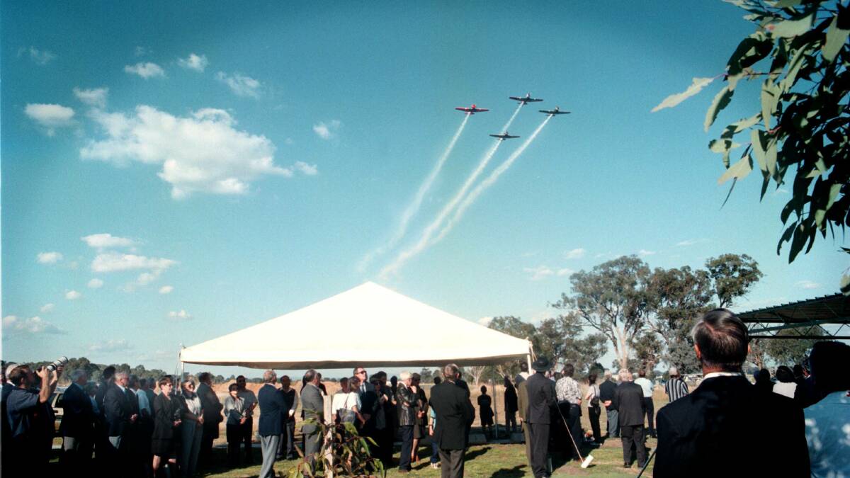 Four planes soured overhead as the mourners looked on at the funeral of Kevin Gleeson. Picture: TANYA LAKE
