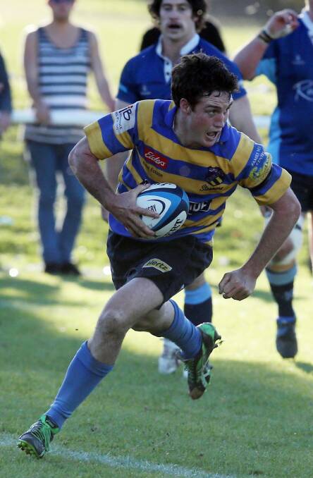 The Steamers' Richard Manion on his way to scoring a try in this year's grand final. 