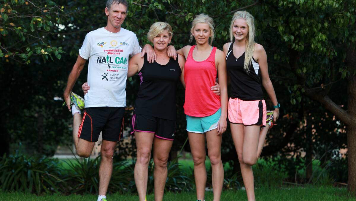 Peter, Paula, Steph, 17, and Olivia Elliott, 14, of Bundalong, will run Nail Can Hill as a family. Picture: MATTHEW SMITHWICK