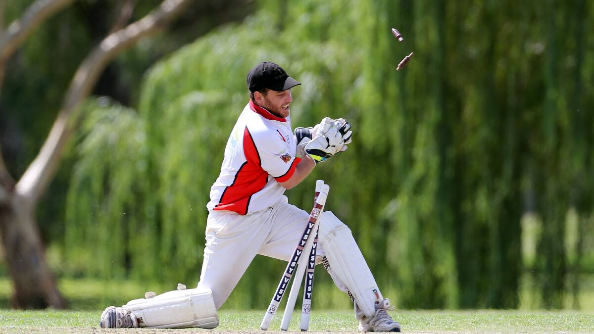 Bethanga’s Sam Lowcock shatters the stumps to end Wodonga’s innings on Saturday. Picture: JOHN RUSSELL
