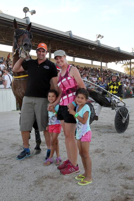 ALBURY HARNESS RACING: Race 1 winner 'Master McGregor', pictured with trainer Andrew Moore and his wife Sarah Moore, as well as their godchildren Kijana McCowan, 5, and Aleira McCowan, 6. Picture: MARK JESSER