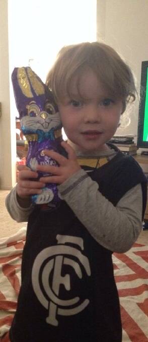 Henry Killeen proudly holds a present from the Easter bunny. - CLAIRE KILLEEN (Facebook)