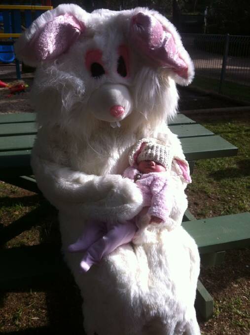 This little baby girl is getting her first pic with the Easter Bunny while he visited the Corowa Caravan Park on Sunday morning. - JULIE BARTLETT (Facebook)