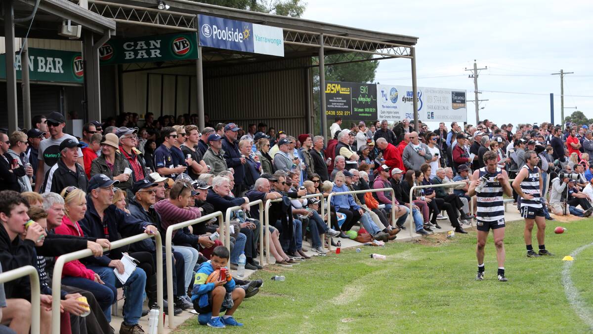 The crowd watches on at the Easter match. 