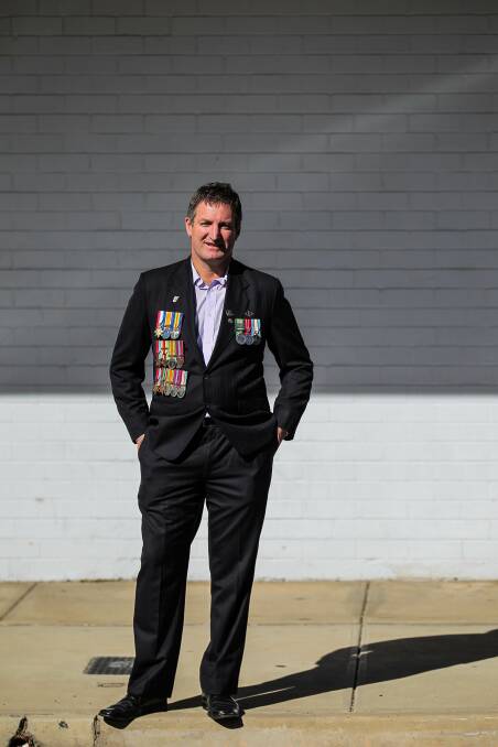  Scott Ansell wore his own medals from service in Somalia and East Timor, and those of his great-grandfather and grandfather. Picture: DYLAN ROBINSON