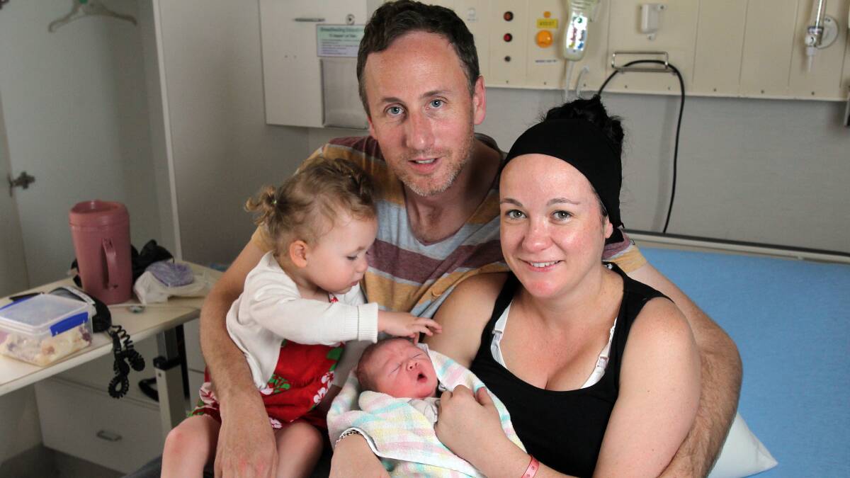 Paul and Trish Anderson with daughter Willow, 2, and newborn baby Felix Allan Anderson. 