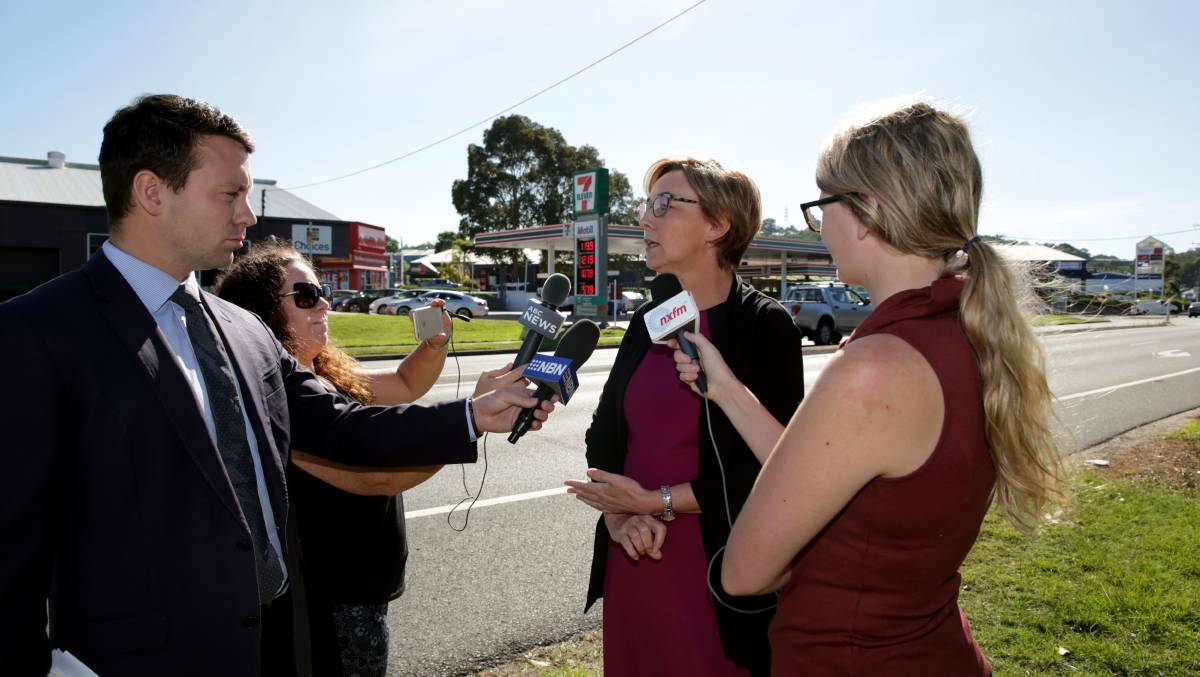 TRAGEDY: Charlestown MP Jodie Harrison talks to media on Hillsborough Road Warners Bay after the accident in April. Picture: Simone De Peak