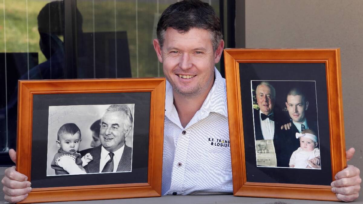 Nico Mathews with a photo of the then Prime minister, Gough Whitlam with Nico when he was 10 months and 21 days old. The other photo is Gough with Nico and his daughter Mackensy at about 10 weeks old pic taken in 2001. Picture: PETER MERKESTEYN