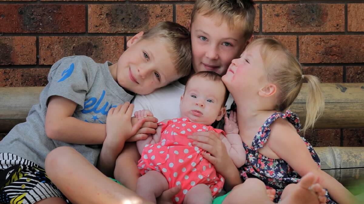 Evie Giddings, 17 weeks old with her siblings, Tex, 5, Connor, 10, and Harper, 2. Evie was the most popular girls’ name on the Border during 2014.