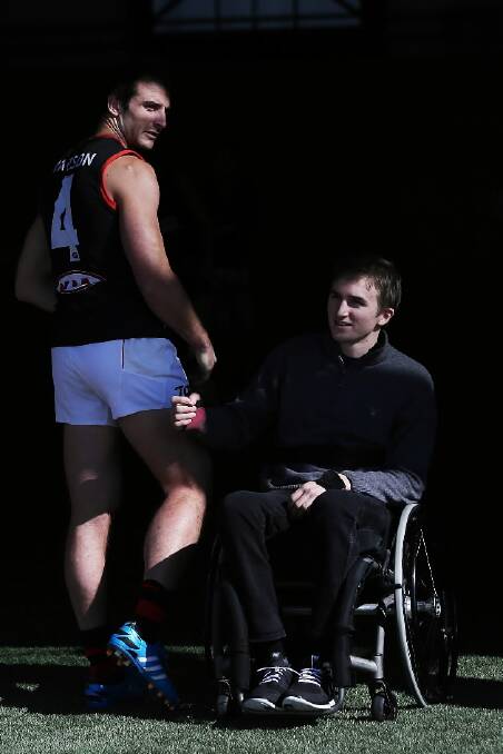 Jobe Watson with James McQuillan at the Bombers' training on Friday.