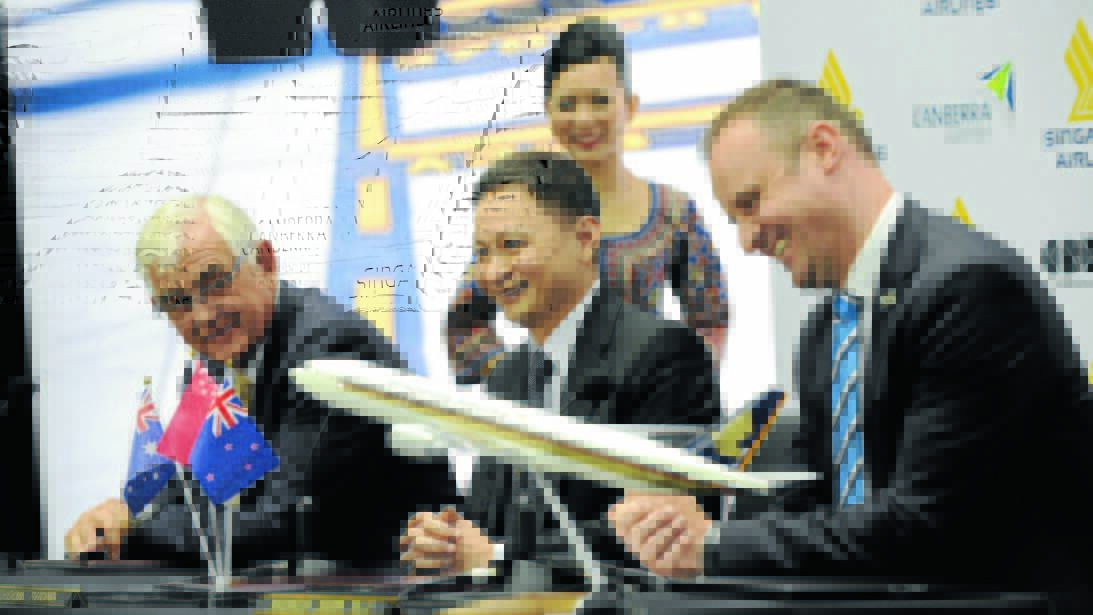 Canberra Airport owner Terry Snow AM, Singapore Airlines CEO Mr Goh Choon Phong and ACT Chief Minister Andrew Barr share a laugh at the launch of international flights from Canberra Airport. Photo by Steve Cuff.