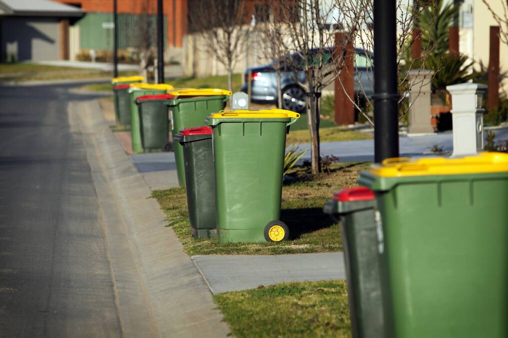 Uncollected rubbish bins lined the streets of Wodonga this week. Picture: MATTHEW SMITHWICK