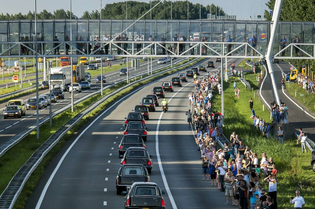 The bodies of the first victims from MH17, shot down over Ukraine, last week arrived back in the Netherlands on Wednesday amid dignified grief tinged with anger. Picture: REUTERS/Marco de Swart 