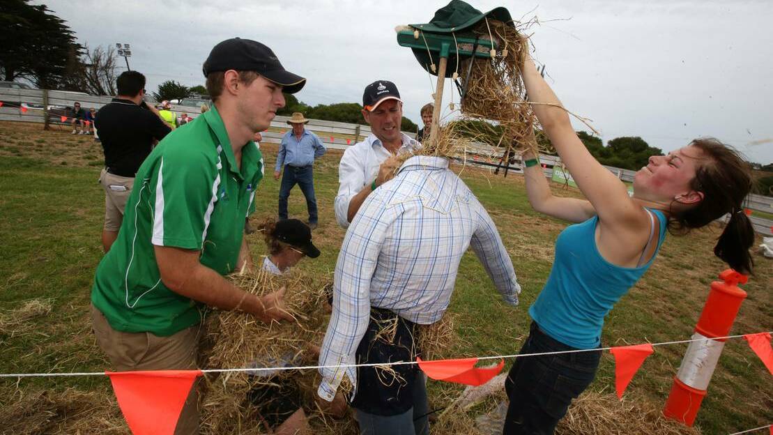 Matt Reynolds (left), Andrea Fahey, Rob Swinton and Zita Ritchie from the winning Farmer Challenge team Crouching Cow, Hidden Tractor, make a scarecrow. – The Warrnambool Standard