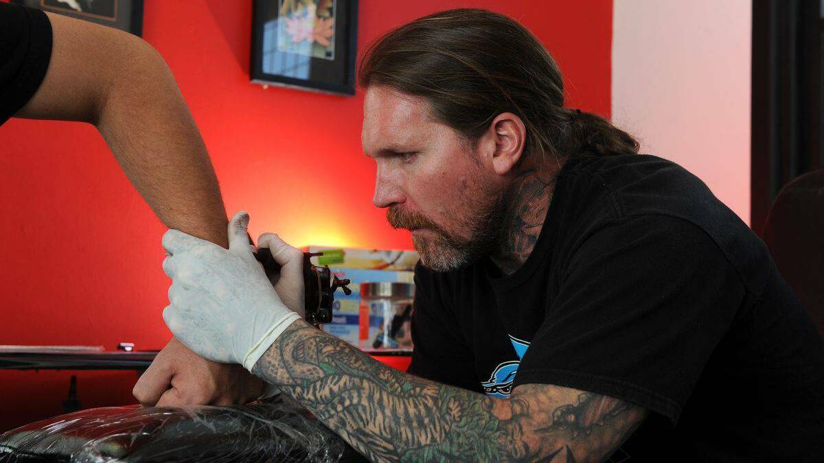 Crusty Demon Seth Enslow is in town to tattoo some of his fans. PICTURE: JUSTIN WHITELOCK – The Ballarat Courier