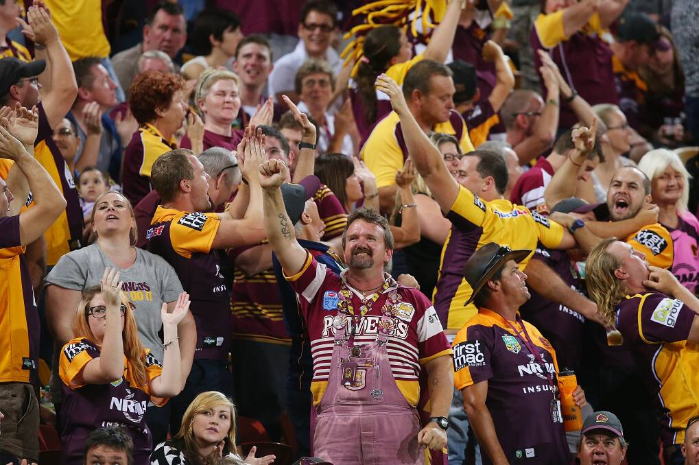 Broncos fans celebrate a Brisbane try. The Eels defeated the Broncos 25-18 on Brisbane turf in Round Five of the NRL. Picture: Getty Images