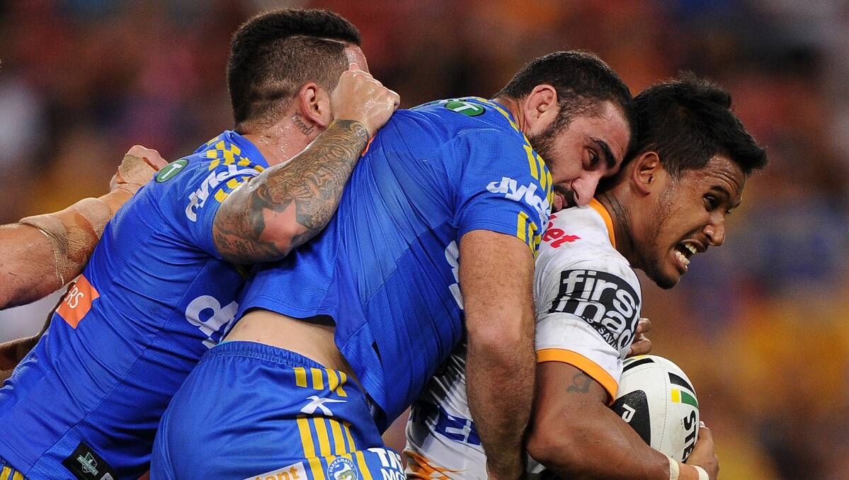 Ben Barba is wrapped up by the Parramatta defence. The Eels defeated the Broncos 25-18 on Brisbane turf in Round Five of the NRL. Picture: Getty Images