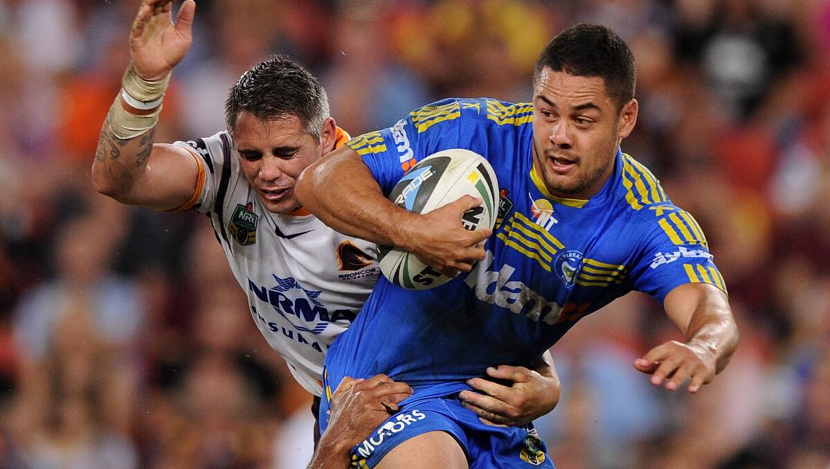 Jarryd Hayne looks to escape the tackle. The Eels defeated the Broncos 25-18 on Brisbane turf in Round Five of the NRL. Picture: Getty Images