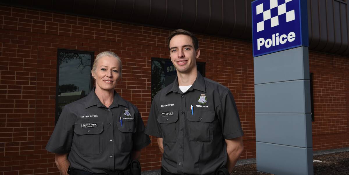 NEW RECRUITS: Custody officers Narelle Perry and James Boehringer during the first day on the job at Wodonga. Their roles as custody officers will help police get back to frontline police duties. Picture: MARK JESSER