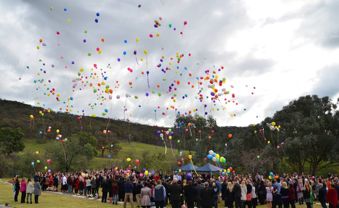 SPIRIT SOARS: Balloons were released after Jess's funeral in her memory. 