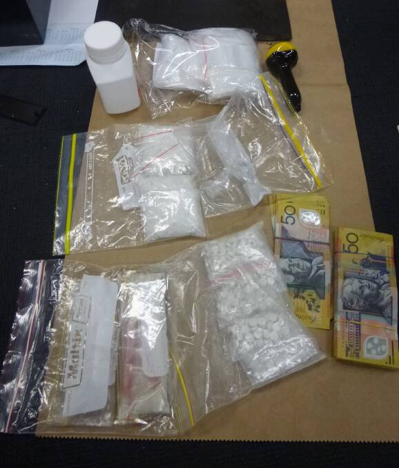 SEIZED: Drugs and cash found at the properties. 