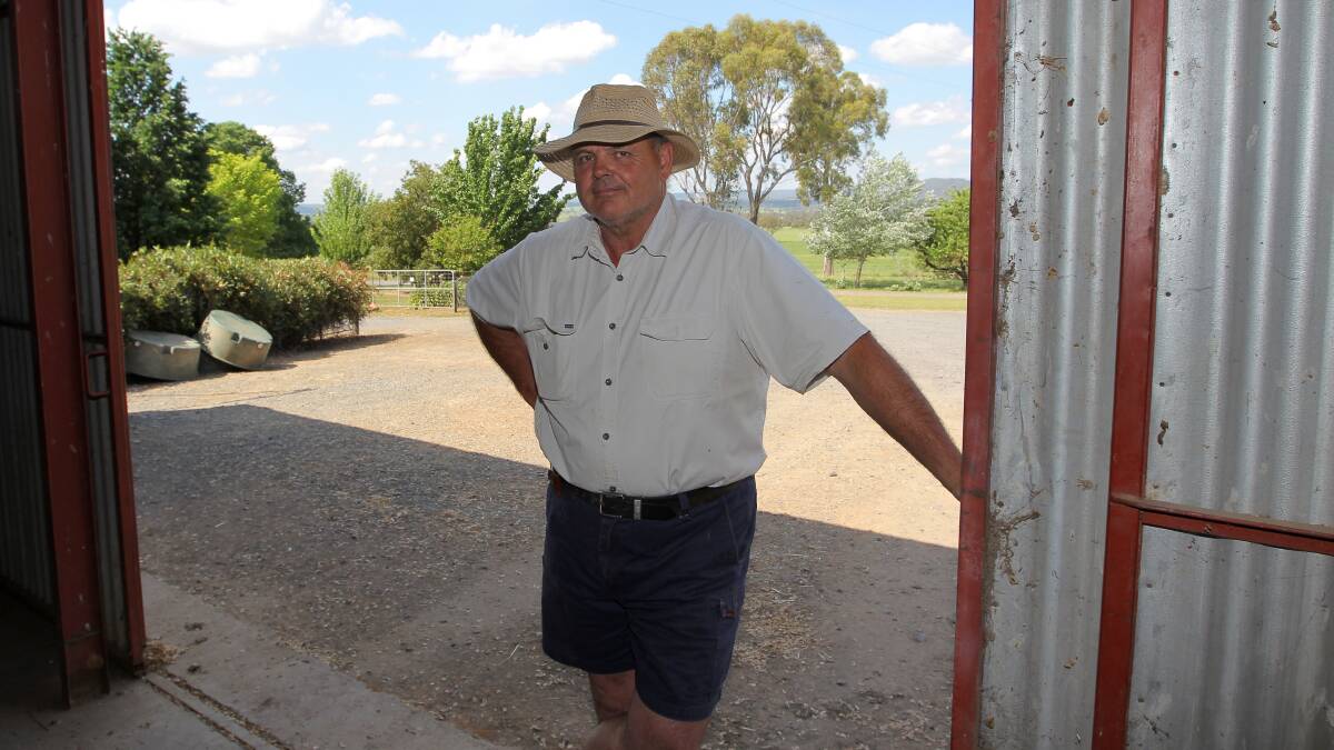 THEFT: Paul Rogers in a shed where his stolen Toyota Landcruiser was parked. Picture: BLAIR THOMSON