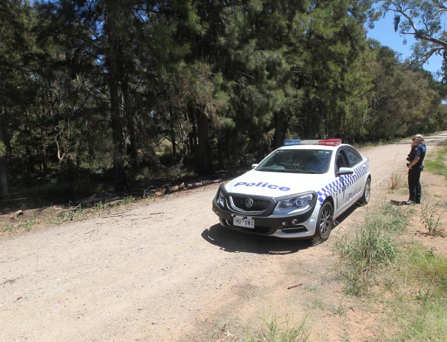 ON SCENE: A crime scene was set up on the stock route next to the Lincoln Causeway in Wodonga following two fires on Saturday. Picture: BLAIR THOMSON