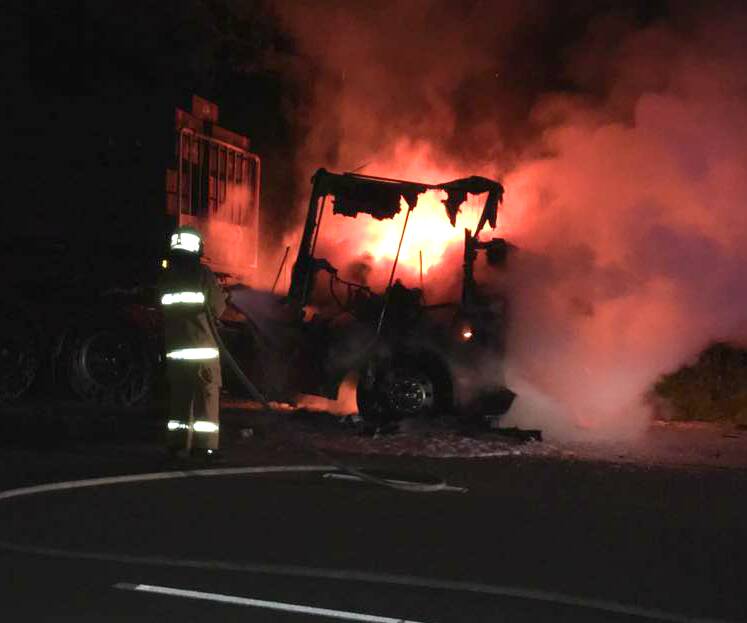 DESTROYED: Witness Tracey Gardiner captured this image of flames leaping from the burning truck near Holbrook on the Hume Highway on Saturday night. 
