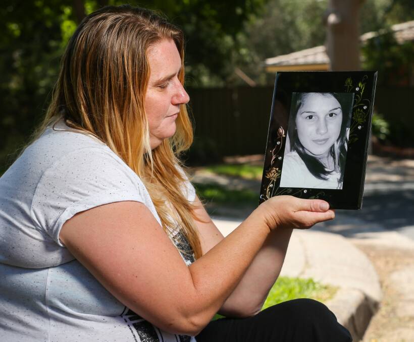 DEVASTATED: Jodie Brunton with a photo of her late daughter, Kyralee Clark, who died after a cross-border police pursuit in 2011. She blames the driver, Nilsson Keith Smyth, for starting the chase. Picture: JAMES WILTSHIRE