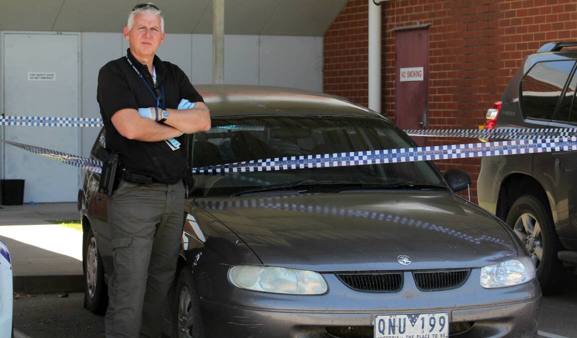 INVESTIGATION: Policeman Peter McGuffie with the vehicle. 