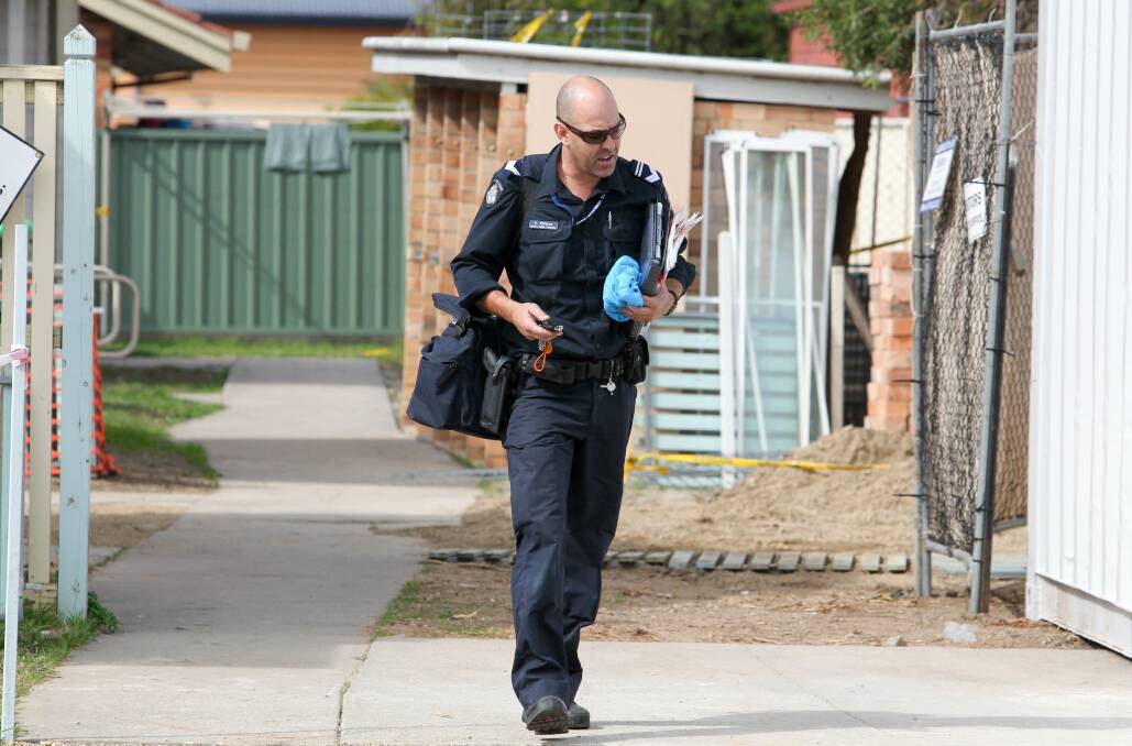 CRIME SCENE: Police conducted a forensic examination at the unit on Sunday afternoon. The victim was released from hospital the same day. Picture: BLAIR THOMSON